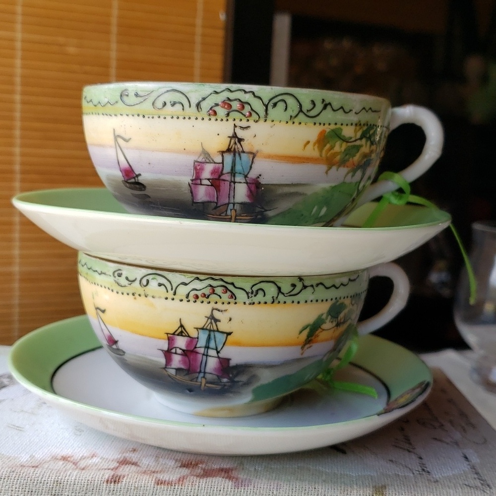 Porcelain teacups hand painted with saucer 2 sets
